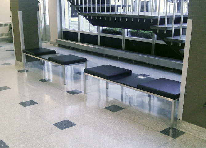 modern bench with upholstered seat for libraries and airports