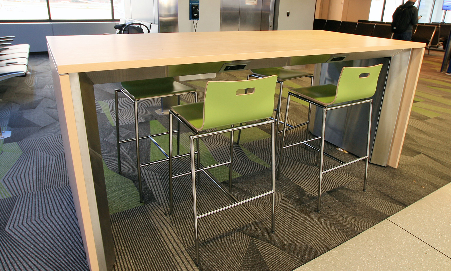 Modern Laminate stool with airport charging table in airport terminal